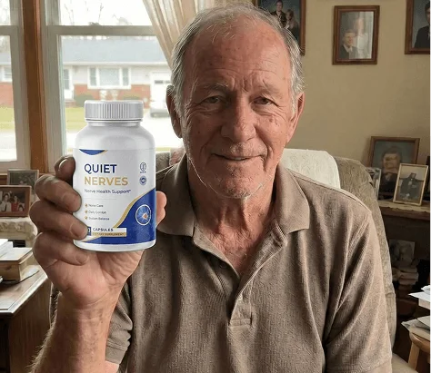 Robert holding his bottle of Quiet Nerves