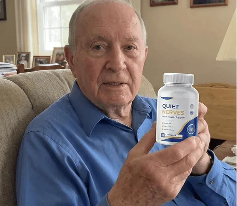 James holding his bottle of Quiet Nerves
